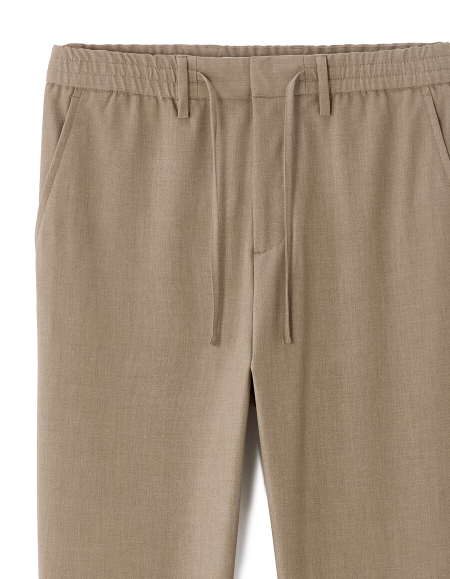 hellbeige schmal geschnittene stretchhose in 78-länge für den ganzen tag